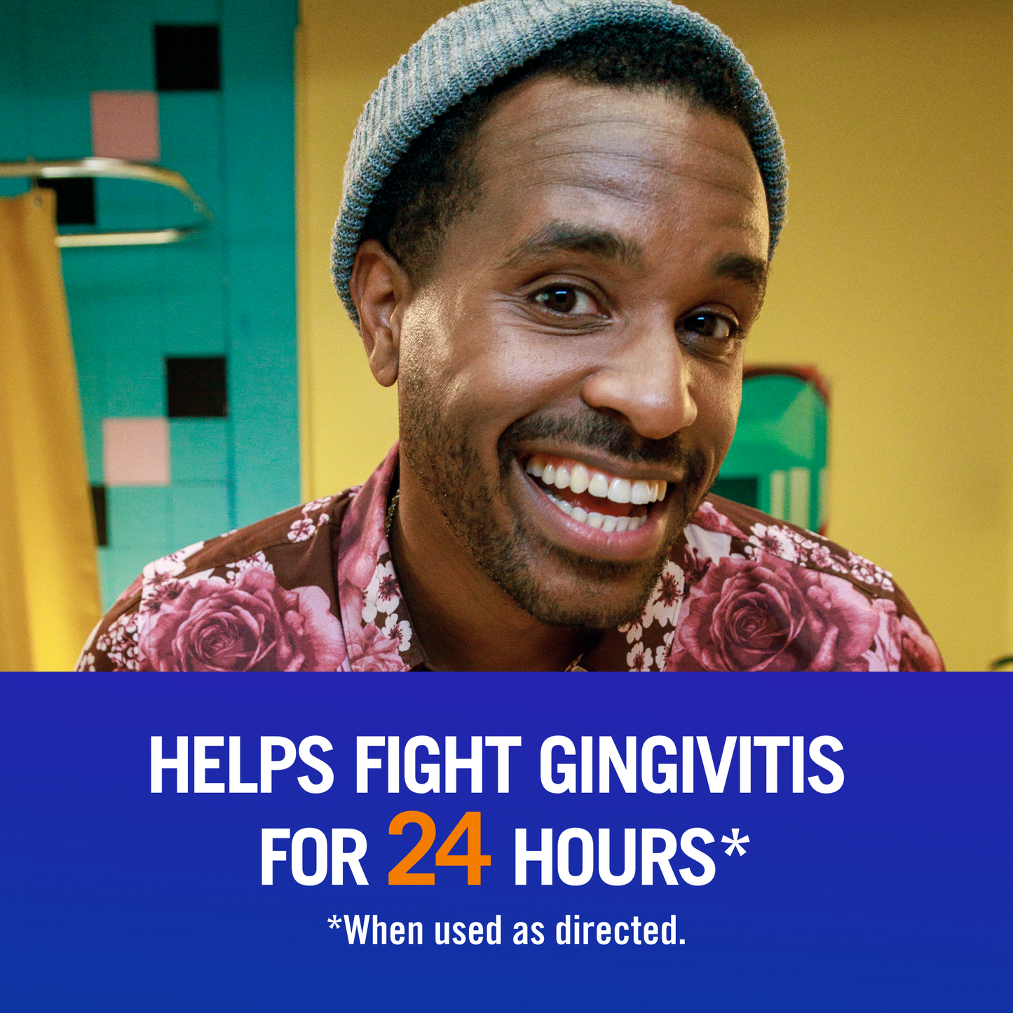 Man smiling after TheraBreath rinse; fights gingivitis for 24 hours.