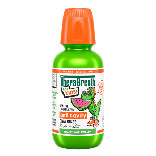 A green bottle of TheraBreath for Kids Anticavity Oral Rinse in Wacky Watermelon