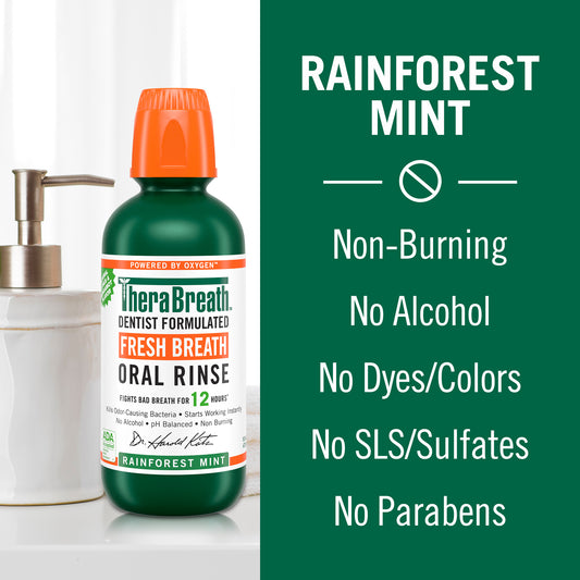 Bottle of TheraBreath Fresh Breath Oral Rinse in Rainforest Mint flavor that is Non-Burning, no Alcohol, no Dyes/Colors, no SLS/Sulfates and no Parabens