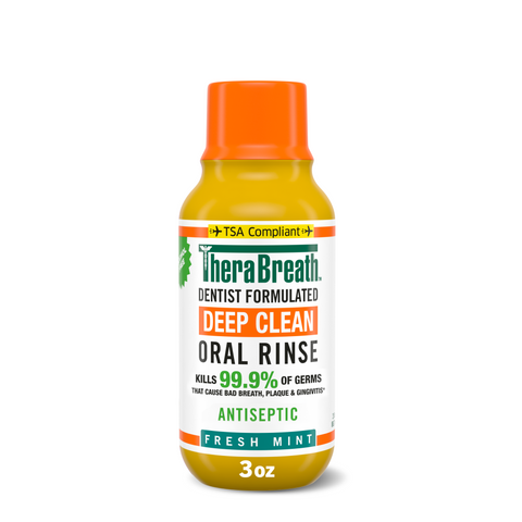 TheraBreath deep clean oral rinse in fresh mint flavor travel size bottle.