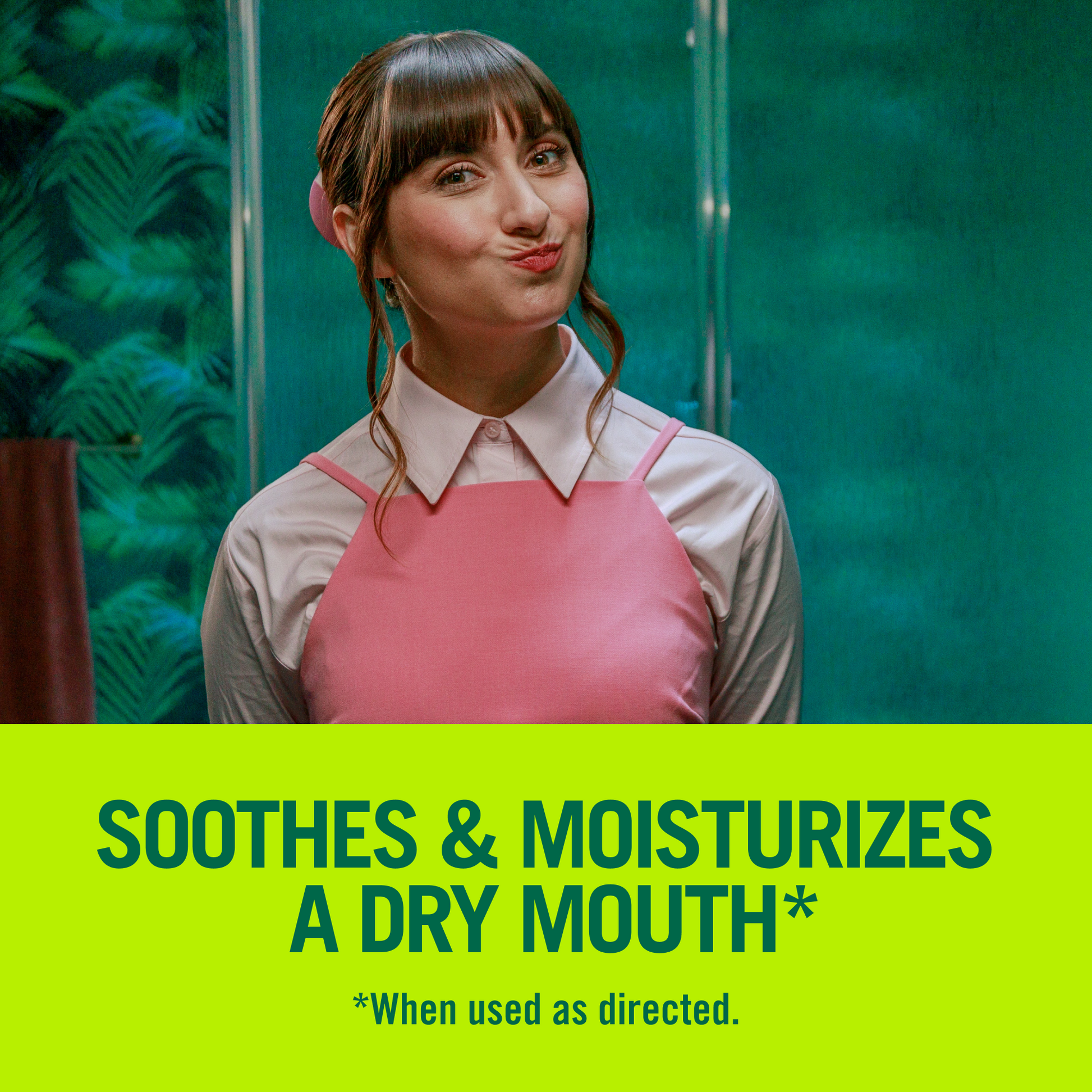 Woman rinsing her mouth with TheraBreath "Soothes & moisturizes a dry mouth when used as directed"