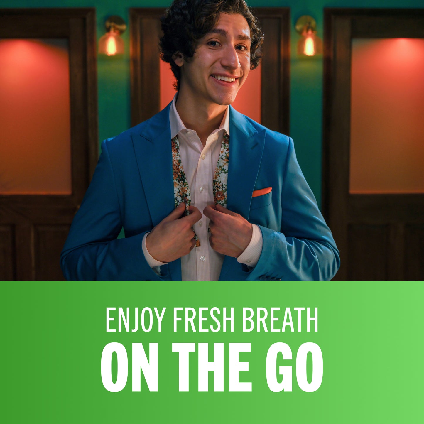 man smiling after using TheraBreath oral rinse with the caption enjoy fresh breath on the go.