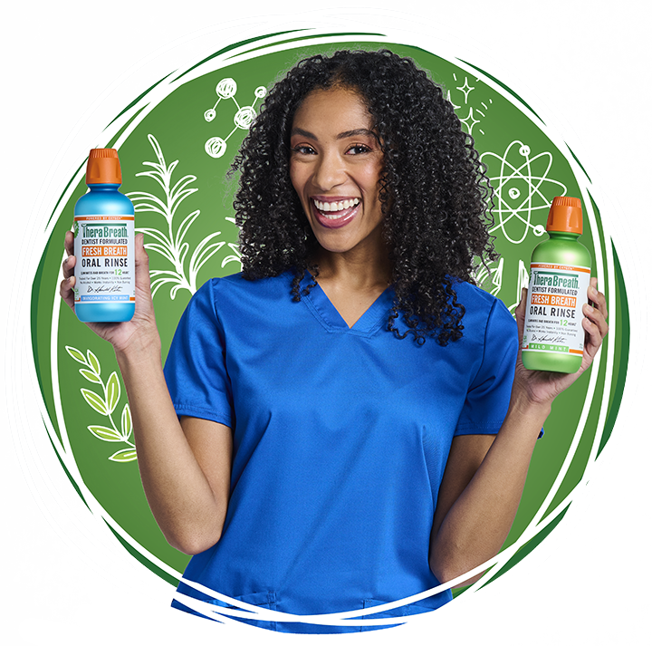 Two bottles of TheraBreath Oral Rinse; one is Invigorating Icy Mint and the other is Mild Mint. American Dental Association Approved